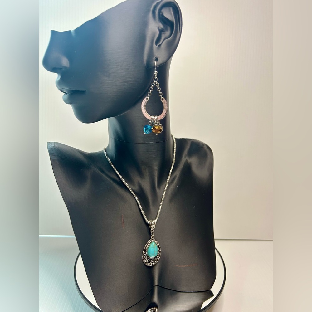 Elegant Silver and Turquoise Necklace and Earring Set
(145)
